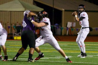 Drew Clarkson protecting Camas QB Reilly Hennessey