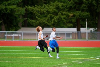 WA Top WR Terence Grady (6-5 190) of Kentwood has broken out over the off season, guarded here by WA elite Safety Keenan Curran.