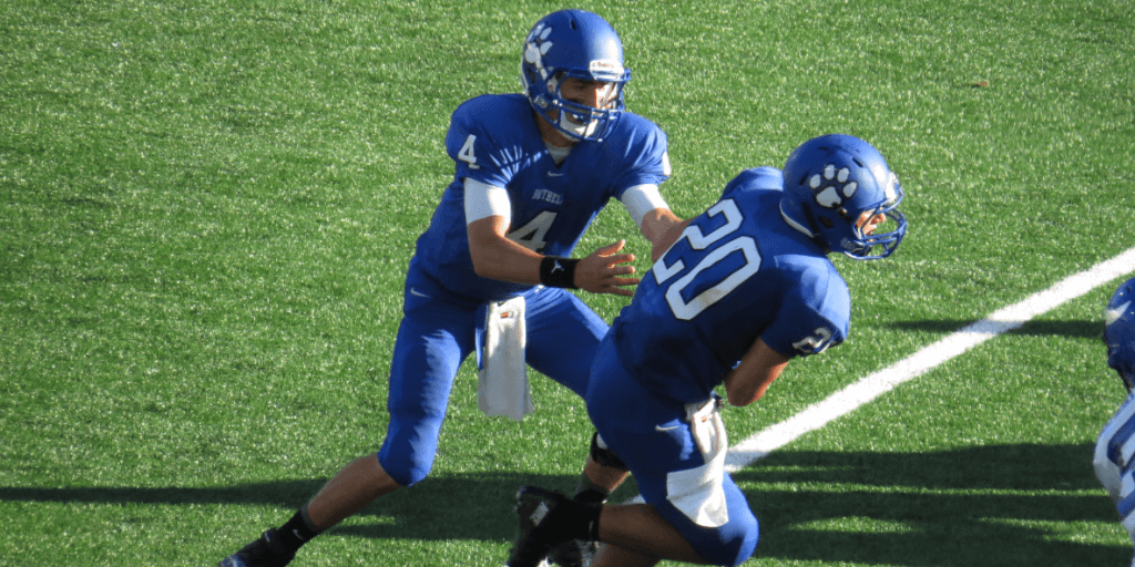 Ross Bowers, left, handing off to Sam McPherson