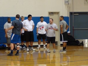 (Line Coach Matt Roth working with the DL)