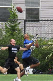 Jackson Keimig, blue, prepares to haul in a long TD at the Skyline Skills & Drills.