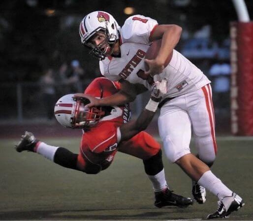 Jaysen Yoro, with ball, sheds a tacklers in an early season game.