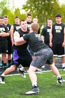 Two of the Metro League and state's better lineman, Josh Brown of Sunset and Tyler Cox of Southridge battle on Sunday.