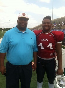 (Coach Marcus Royster, Left)