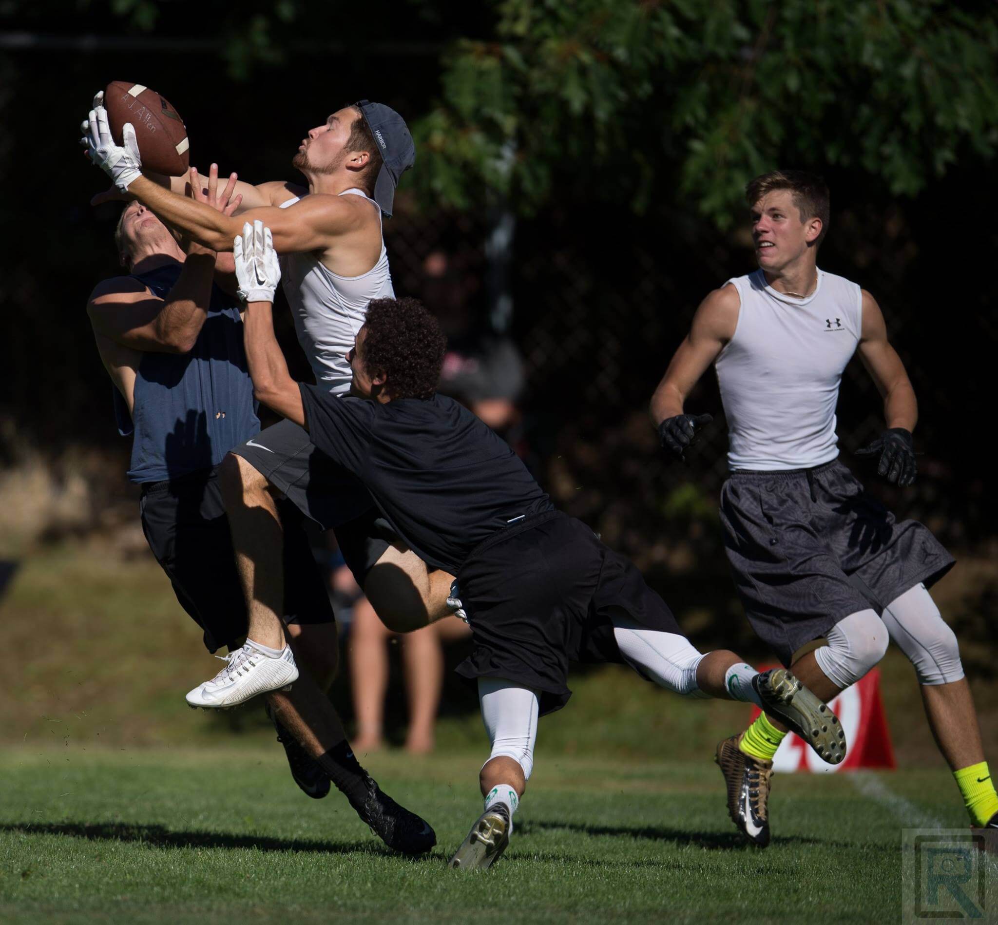 Noah Samsen fights for a ball, while teammate Joe Nelson anticipates a tip.