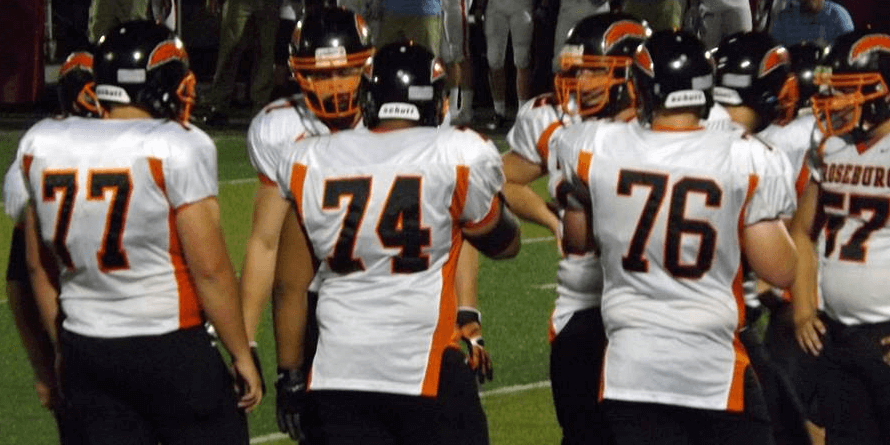 Roseburg's talented Junior O line ; (L-R) #77 Shon Atterbury (6-3 290) #74 Isaiah Smith (6-0 265) #76 Zack Caddock (6-2 240)