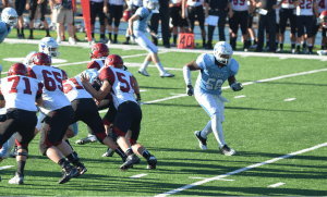 (Marqueese Royster, right, headed into the backfield)