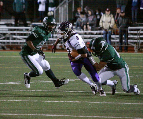 Tevin Gray fights to break a tackle.