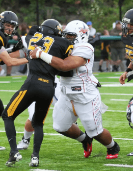 Thomas Toki with one of his many tackles for a loss.