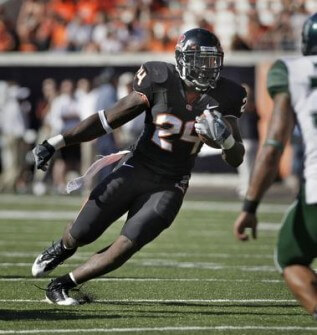 Barton Football Coach Ryan McCants with a carry against Hawai'i as a member of the Oregon State Beavers.