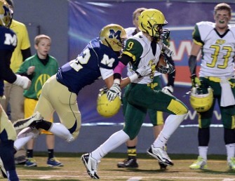 Tyler Puletasi chasing down a Shadle Park receiver.